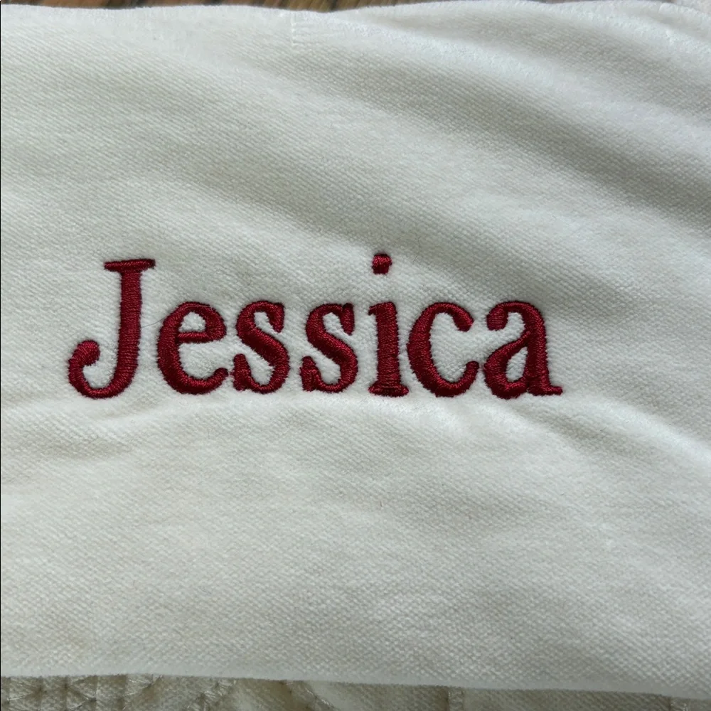 Pottery Barn cream colored quilted stocking with Jessica embroidered